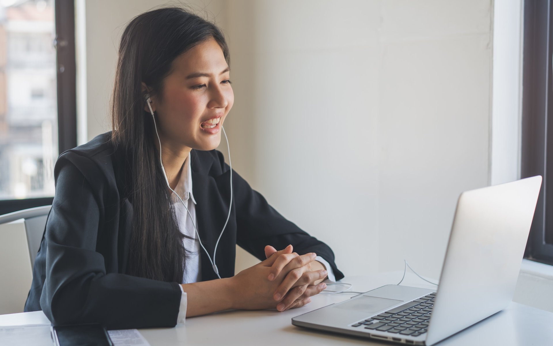 Young woman in an online meeting