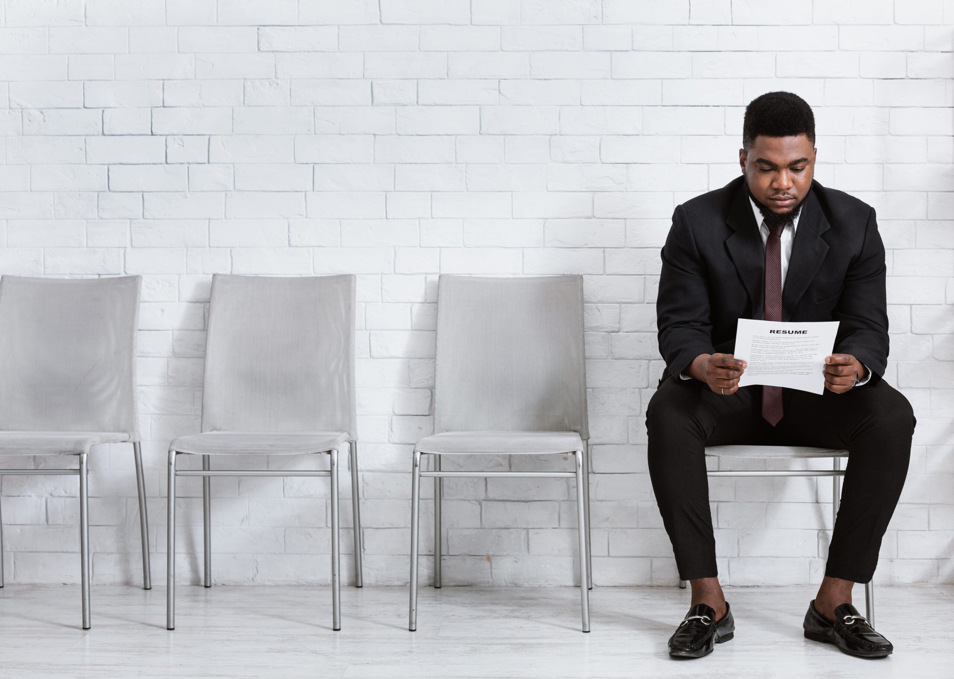 Man reading his resume