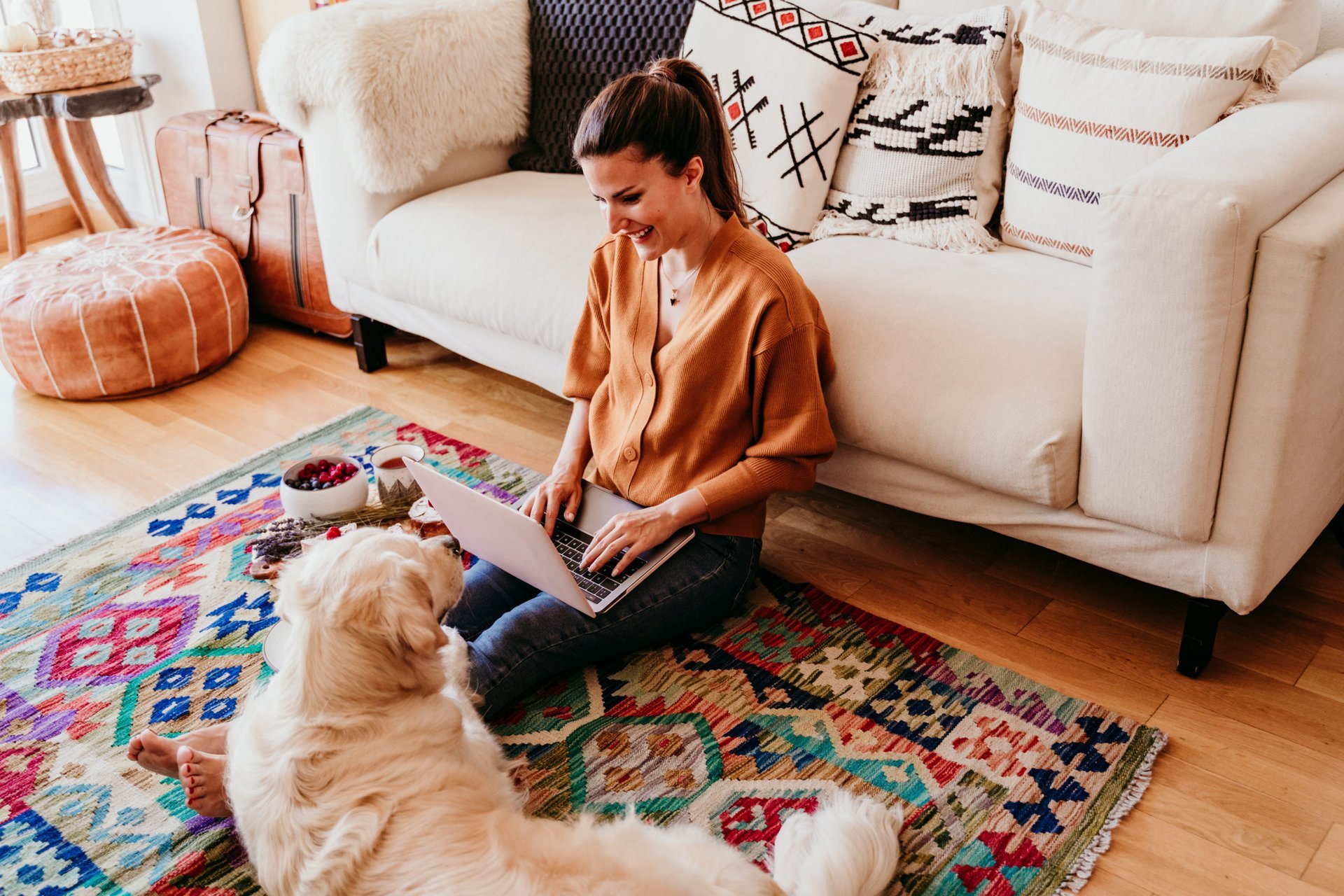 Woman using a laptop at home